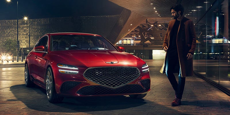 2022 Genesis G70 with man walking around car